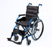 Child’s folding wheelchair with padded seat and flip arms